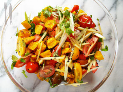 Tomato, butternut pumpkin and ginger salad with tamarind and sesame dressing.
