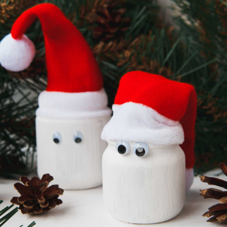 2 Jar snowmen with Santa hats.