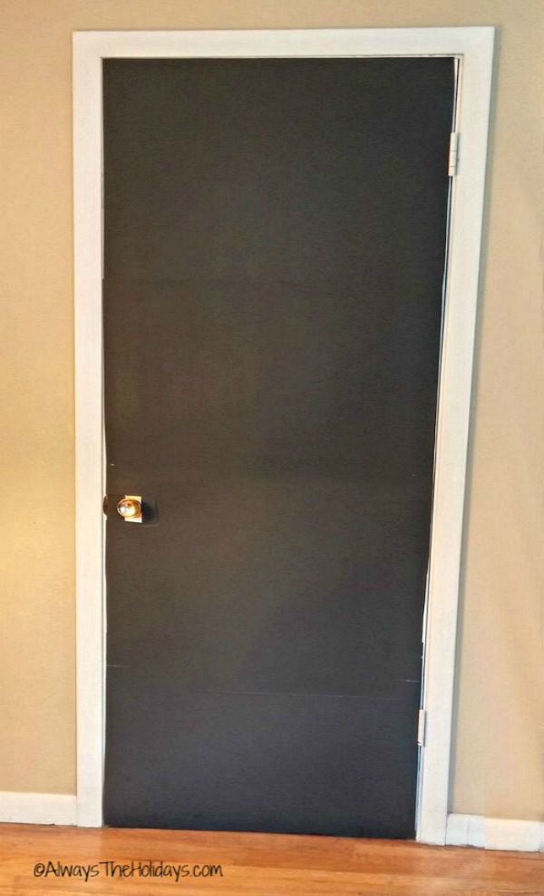 Door covered in black paper.