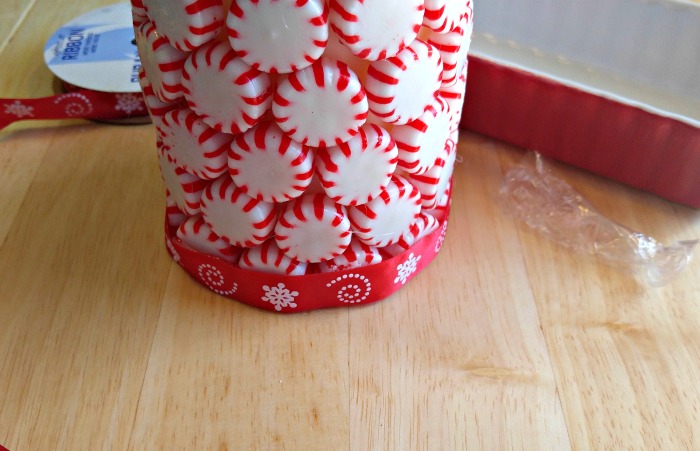 ribbon on a peppermint candle Attach a festive ribbon to the bottom of the Peppermint Candle.