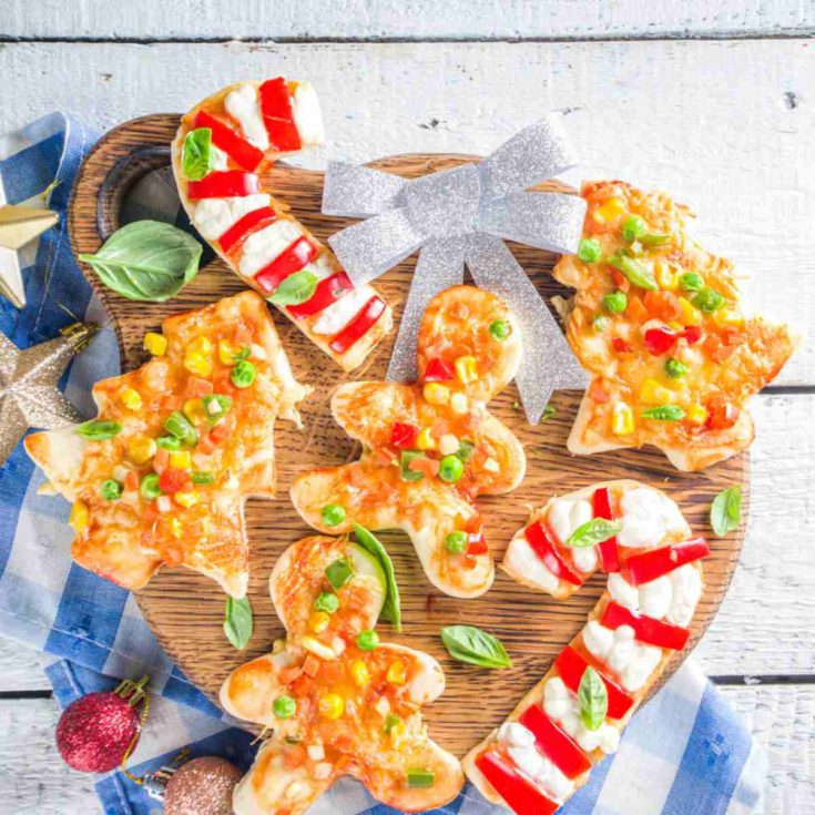 Mini pizzas made with cookie cutters.