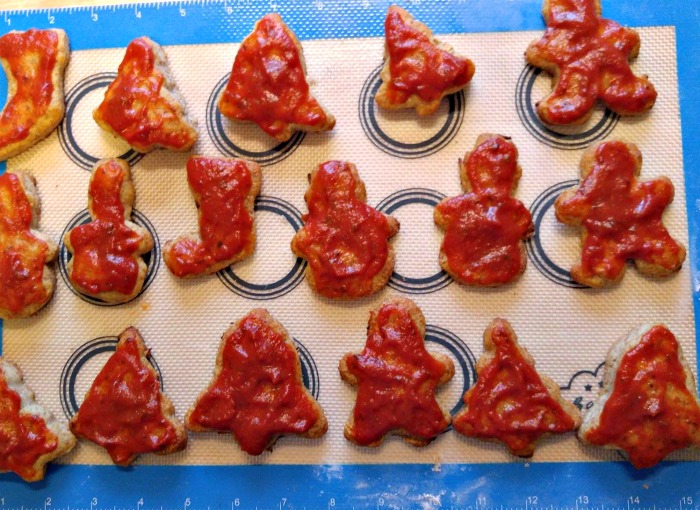Add pizza sauce to the festive holiday shapes