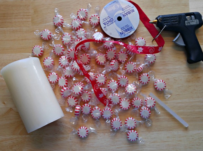 candle, peppermints, ribbon and hot glue Supplies for the Peppermint Candle