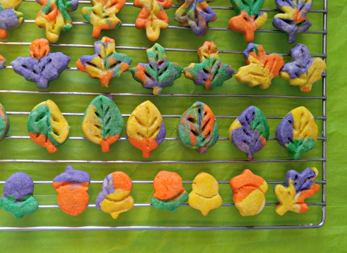 Thanksgiving autumn leaf cookies cooling on a wire rack.