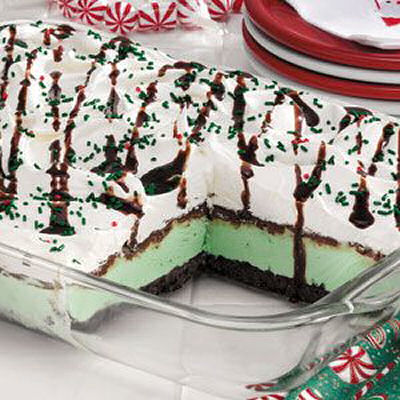 Mint cream dessert. Mint cream dessert in a pyrex container on a table.