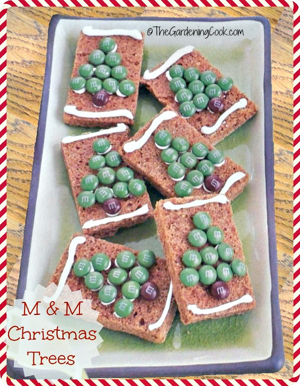 Gingerbread tree bars. M&M gingerbread tree bars from on a plate with a text overlay.