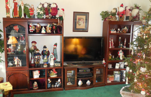 Television wall unit with Santa Claus collection. Television wall unit with Santa Claus collection.