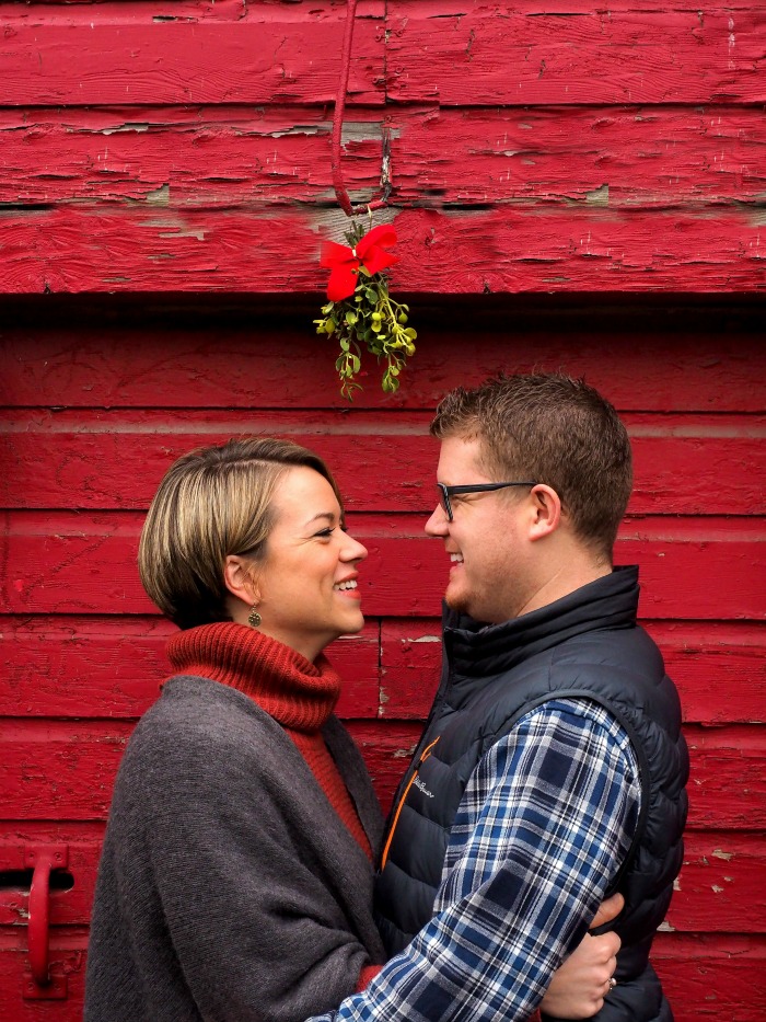 couple kissing under the mistletoe Couple kissing under the mistletoe