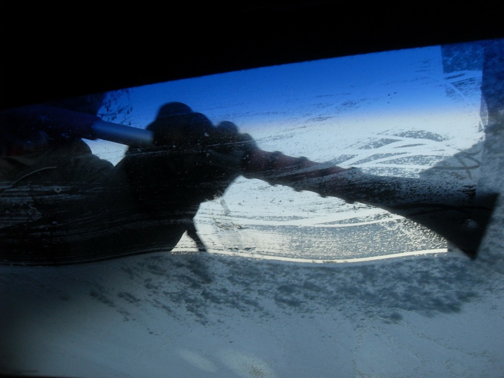 Heating your car and scraping the ice is still the best way to get the ice off.