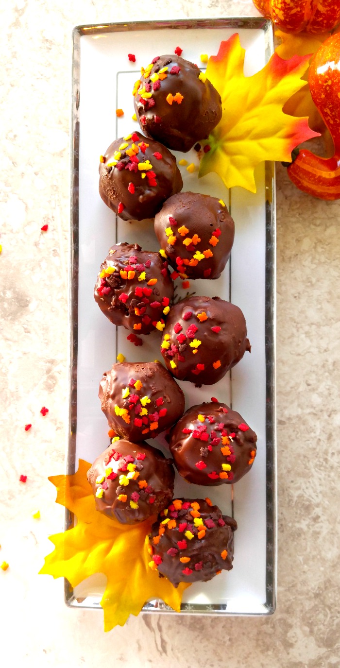 Theses peanut butter chocolate truffles have a lovely coating of chocolate with some autumn leaf sprinkles. I love the texture that flax seeds and chia seeds add to the mixture.