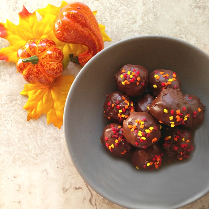 Theses peanut butter chocolate truffles have a lovely coating of chocolate with some autumn leaf sprinkles. I love the texture that flax seeds and chia seeds add to the mixture.