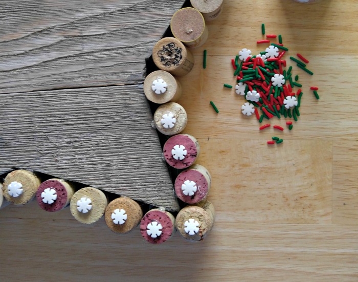 Wilton snowflakes cover the corkscrew hole
