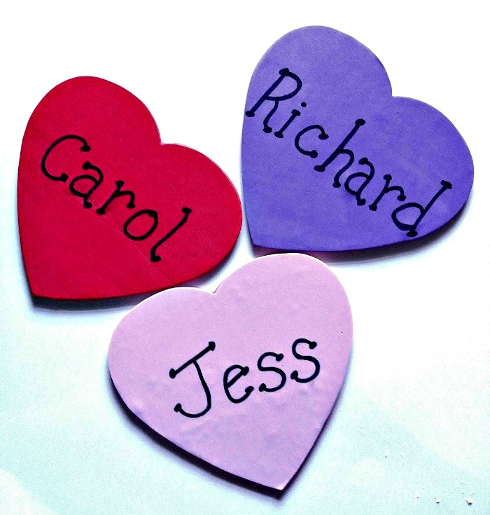 attach foam shapes to the wooden hearts