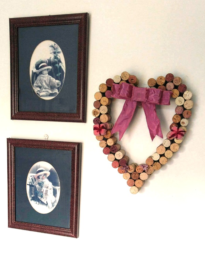 Wine Cork Heart Wall Hanging Displayed with photos of my daughter
