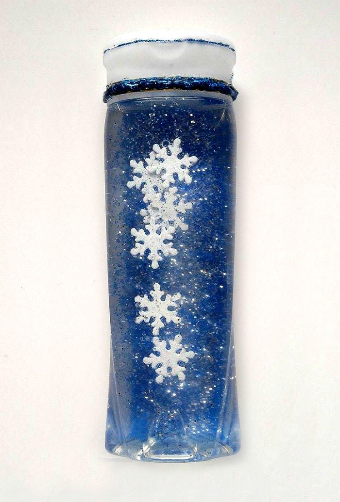  Calm Down Jar with blue liquid and white snowflakes.