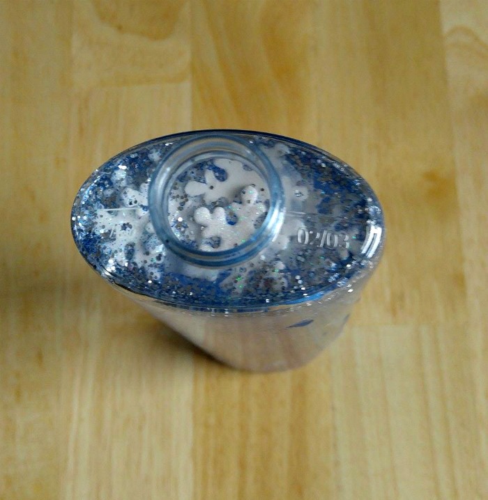 Snowflakes in the top of a calm down jar
