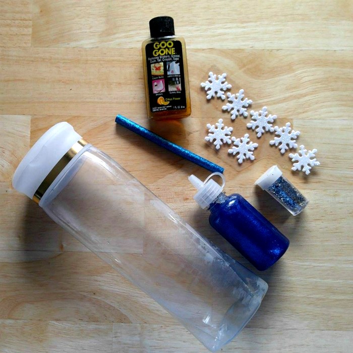 Goo Gone, snowflakes, glitter, jar and glitter glue stick for the snowflake calm down jar