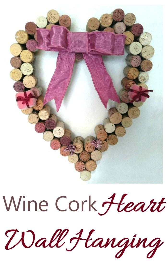 This Wine Cork Heart Wall Hanging goes beautifully with these framed photos made from anniversary cards. It makes a romantic home decor item.