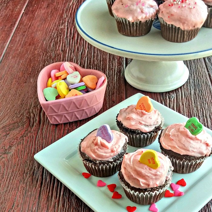 Conversation hearts make a nice easy valentine cupcake decoration.