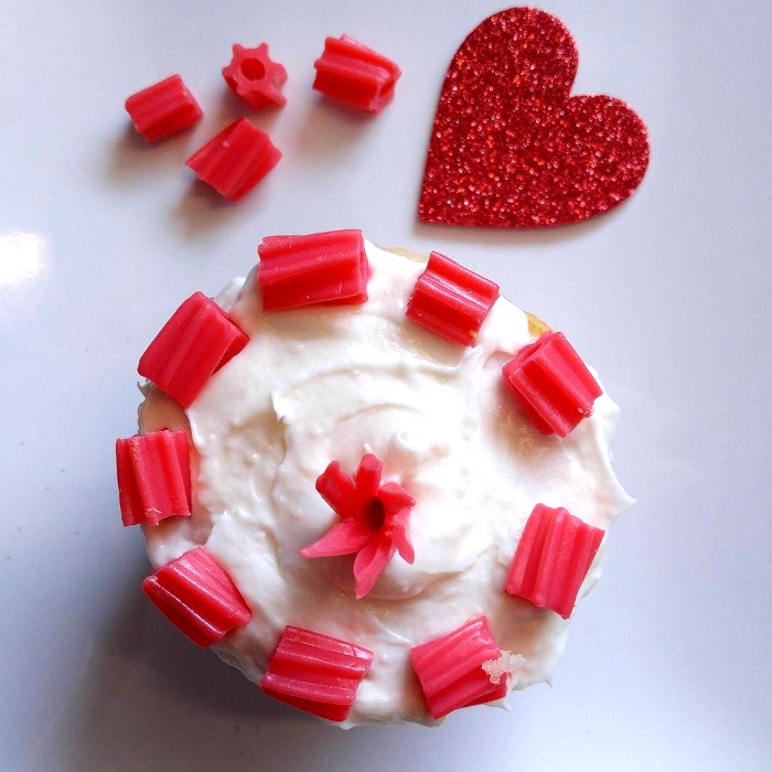 Cut Twizzlers into pieces and decorate a cupcake with them.