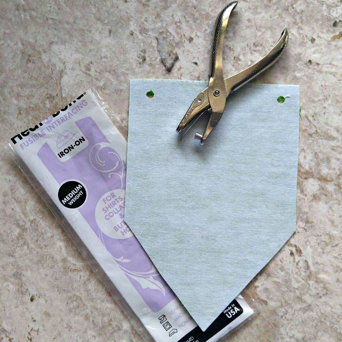 Bond the burlap and punch holes for the ribbon