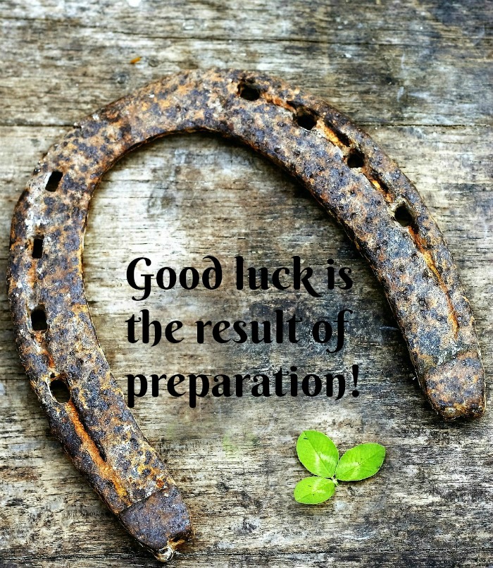 St Patrick's Day good luck quote. A horseshoe on a wooden board with a St Patricks Day quotes text overlay.