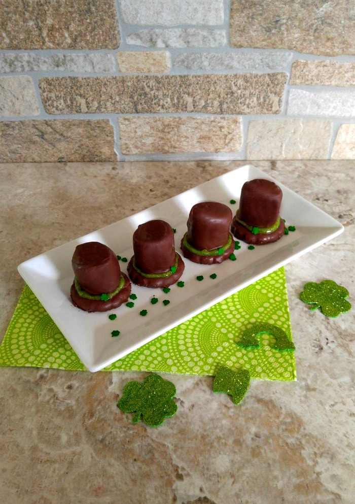 Leprechaun hats on a serving plate Leprechaun hat cookies on a serving plate