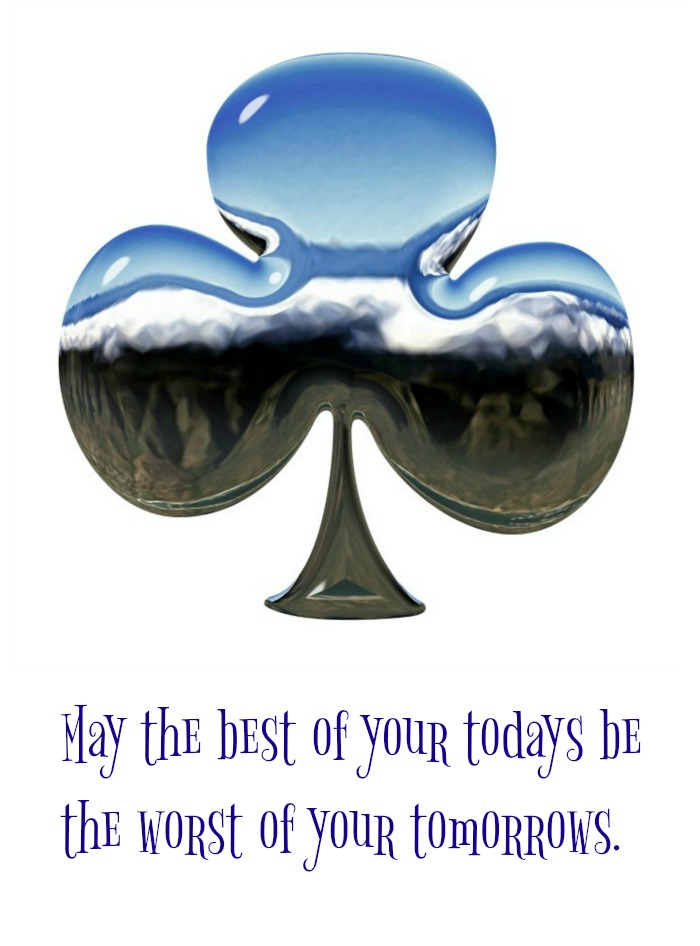 Silver clover and good fortune quote. A silver clover with a good fortune quote text overlay.