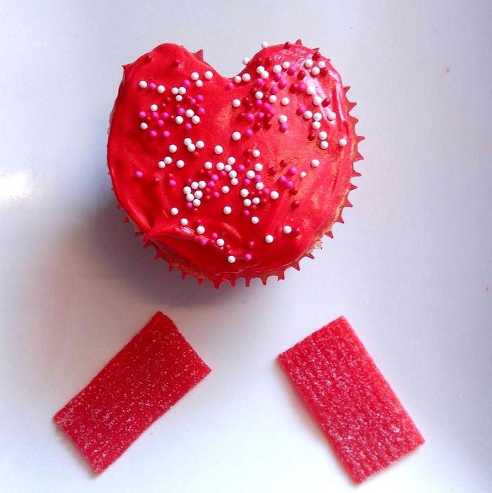 Sprinkles on a red frosted Valentine Cupcake