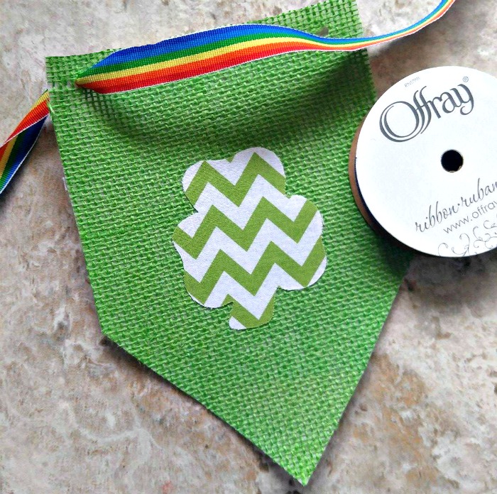 Thread the ribbon for the St. Patrick's Day Banner