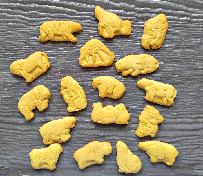 Animal crackers laid out on a table.