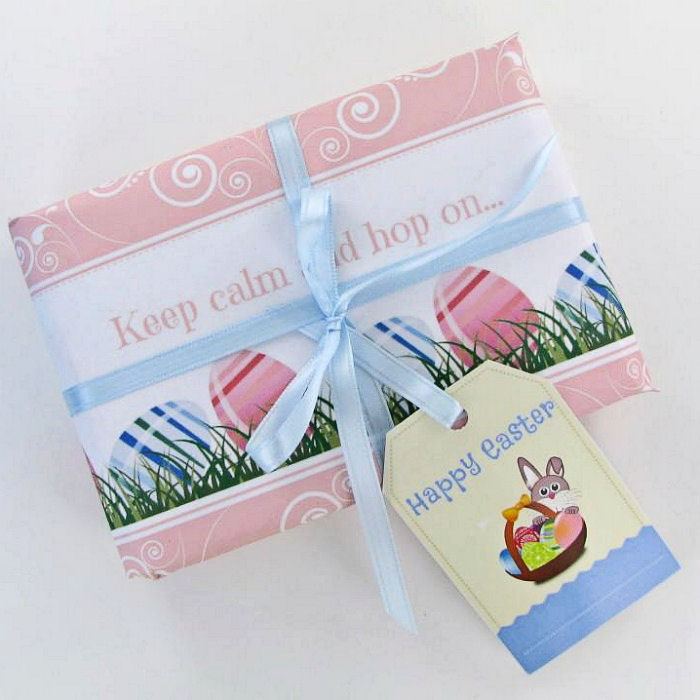 A wrapped Easter gift with an Easter gift tag on it.