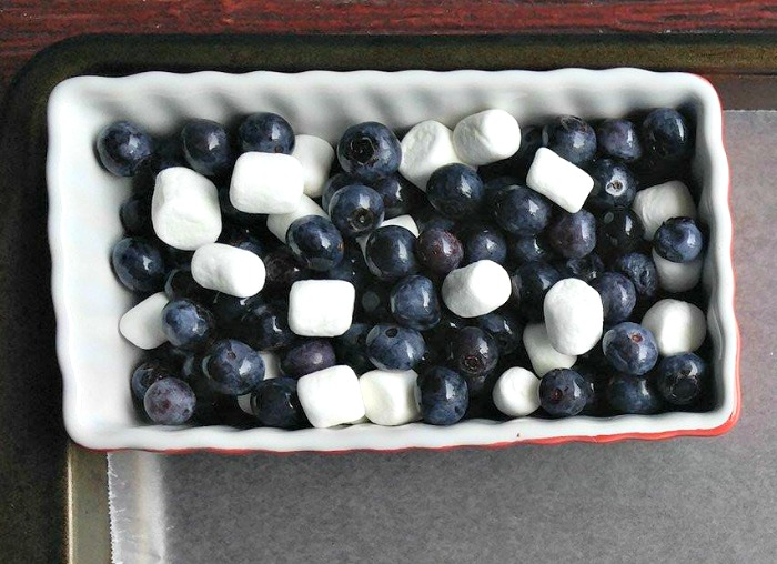 bowl of blueberries and mini marshmallows Bowl of blueberries and marshmallows in a rectangular dish