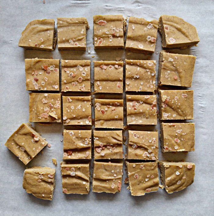 squares of Salted Pumpkin Fudge on parchment paper Squares of Salted Pumpkin Fudge