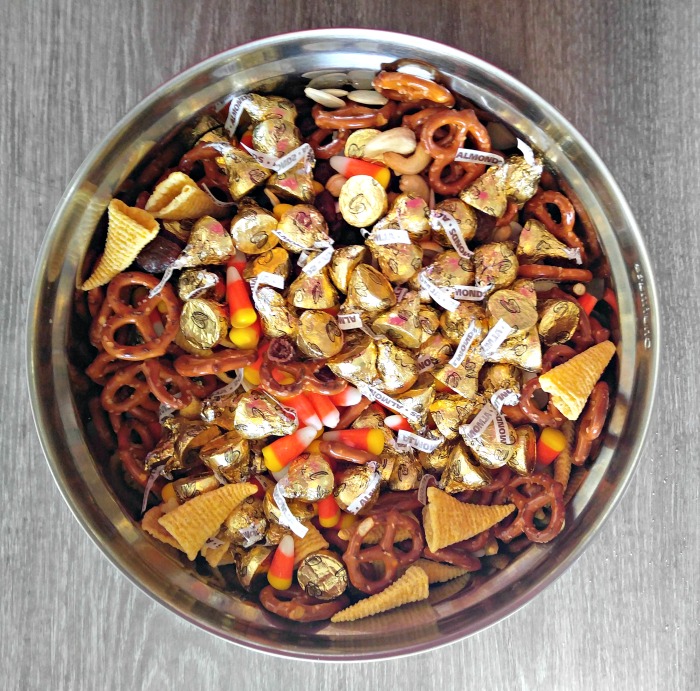 Candy kisses with Bugles, pretzels, nuts, candy corn and dried fruit.