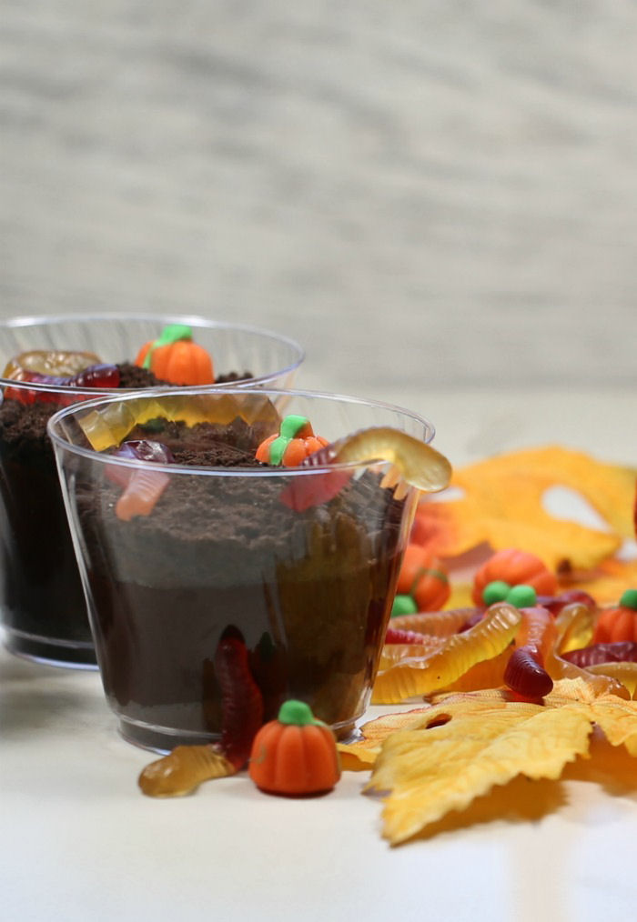 Dirt pudding cups. Dirt pudding cups with gummy worms and candy pumpkins.