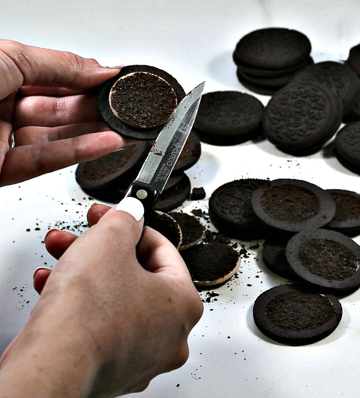 Removing cream from Oreos. Removing creams from the Oreo cookies.