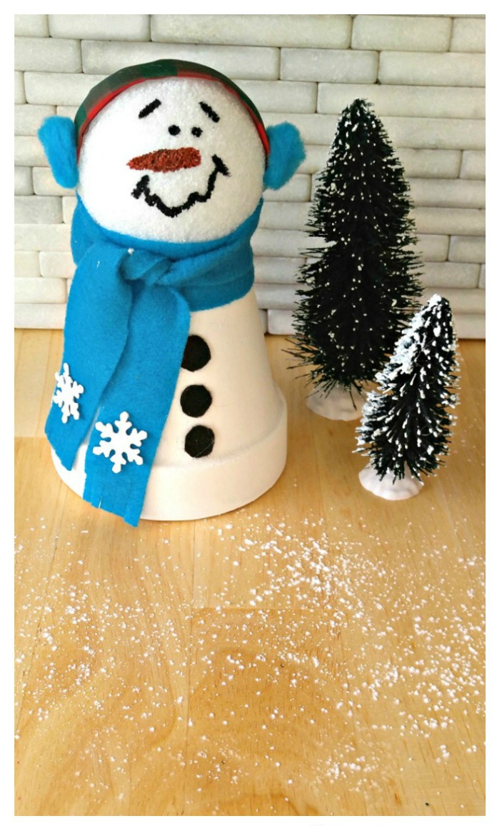 This cute snowman is made from clay pots and is ready to display in just minutes. 