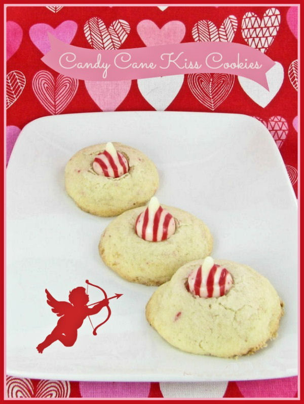 These Valentine's Day kiss cookies have a sugar cookie base and striped peppermint kiss on top