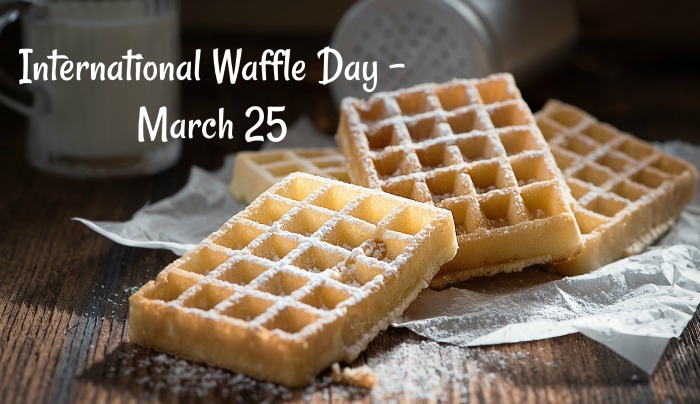 waffles on a cutting board with overlay International Waffle day is March 25