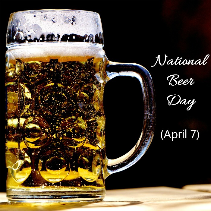National beer day written on a photo of a mug of beer against a black background.