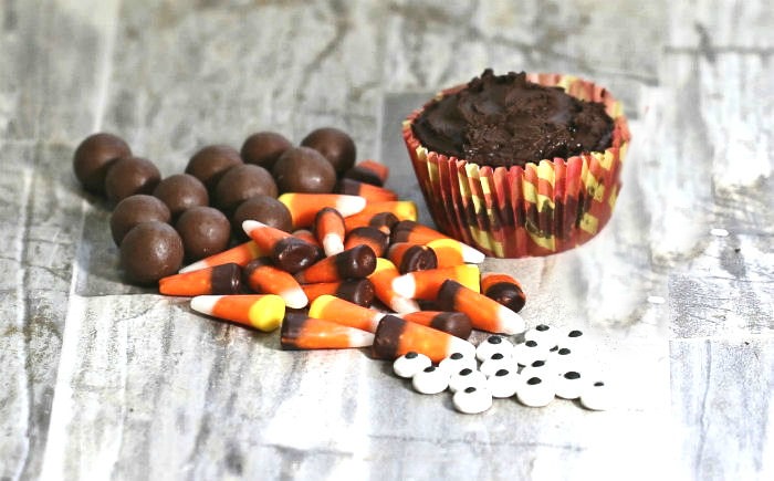 candy corn, malted milk balls, edible eyes and cupcake These chocolate cupcake, malted milk balls, candy corn and edible eyes will make our turkey cupcakes.