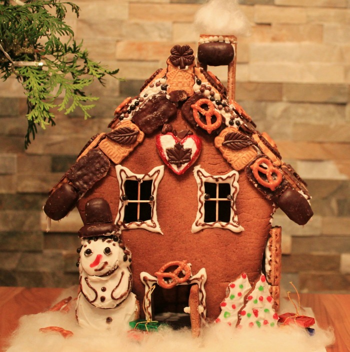 Gingerbread house with cookies and pretzels