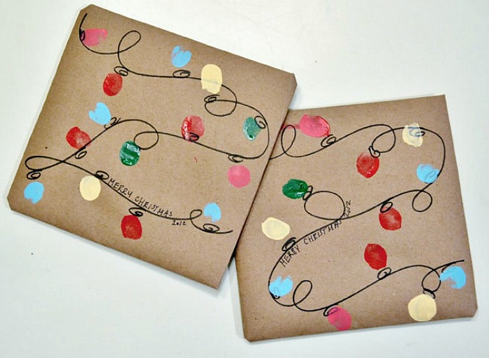 Thumbprint Christmas lights gift wrap Thumbprint Christmas lights gift wrapping idea from Burlap and Blue
