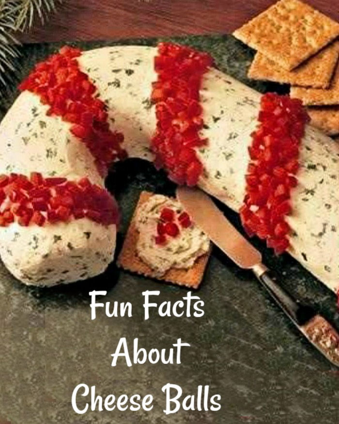 Candy cane cheese log. Facts about cheese balls text overlay on top of a photo of a cheese log shaped like a candy cane with crackers and a cheese knife beside it.