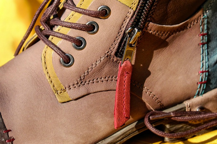 boots with zipper Zippers were first used in fashion items in the early 1930s