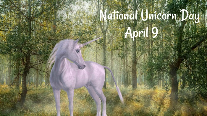 A unicorn in a forest. A unicorn in the forest with "National Unicorn Day April 9" written in the top right corner.