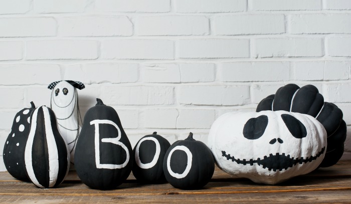 Black and white pumpkin vignette. Painted heirloom pumpkins in black and white colors.