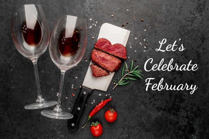Wine glasses, food on a meat cleaver, rosemary sprig, chili and tomatoes with words reading "Let's celebrate February."