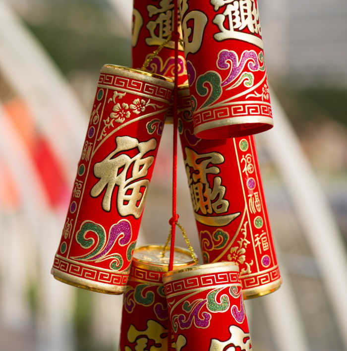 Chinese golden firecrackers Chinese golden firecrackers hanging in a row.